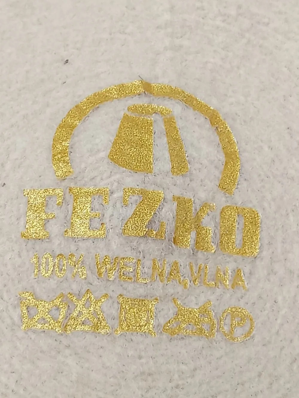 Mützen>Fezko Baskenmütze wollweiß