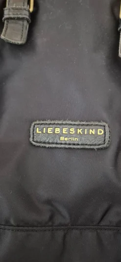 Henkeltasche- Online