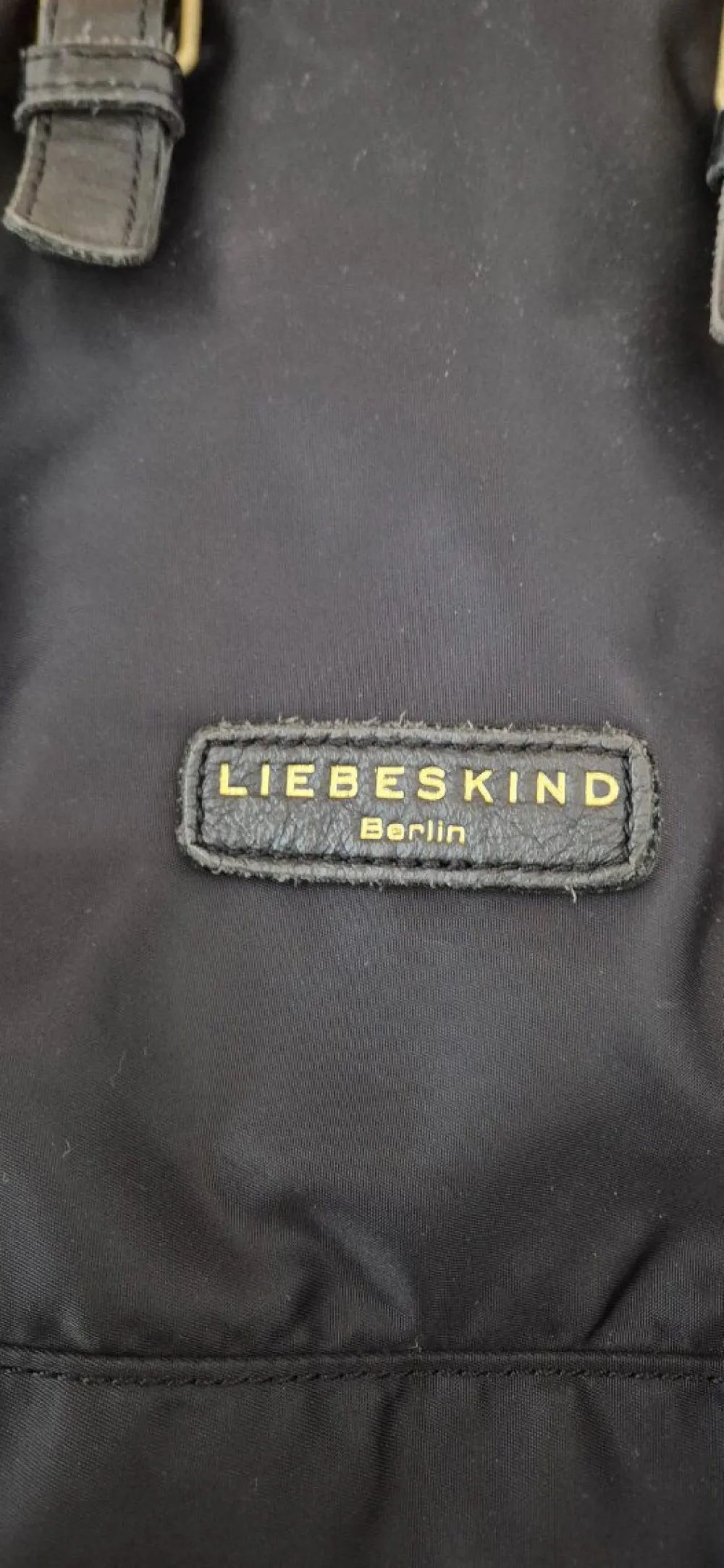 Henkeltasche- Online