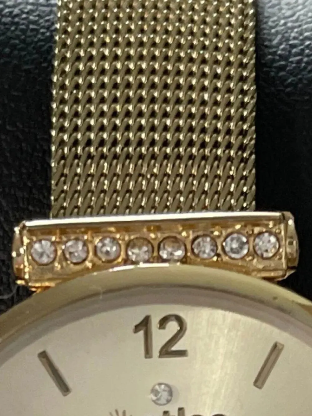 Uhren>atlas Uhr goldfarben